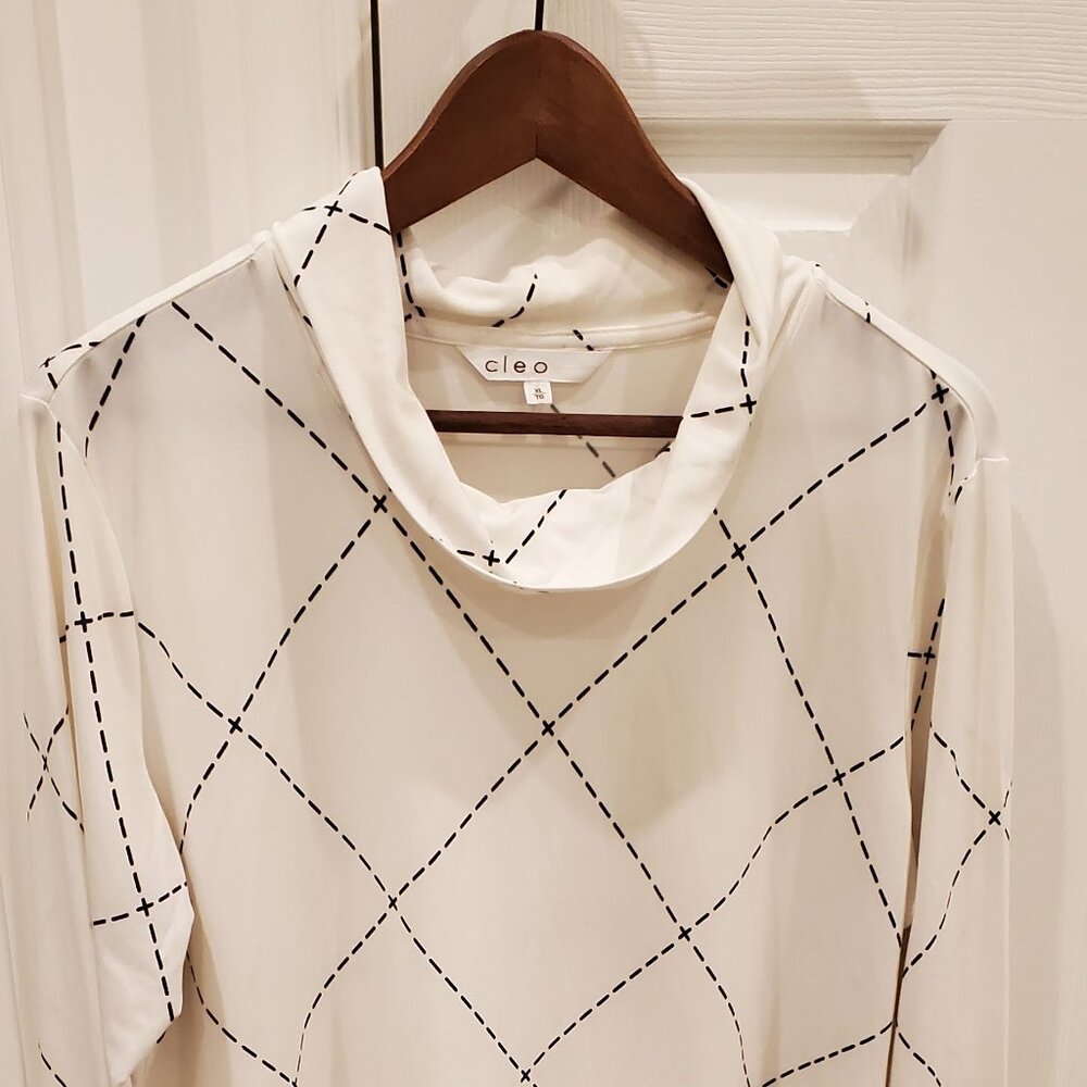 Long sleeve, mock neck cream top